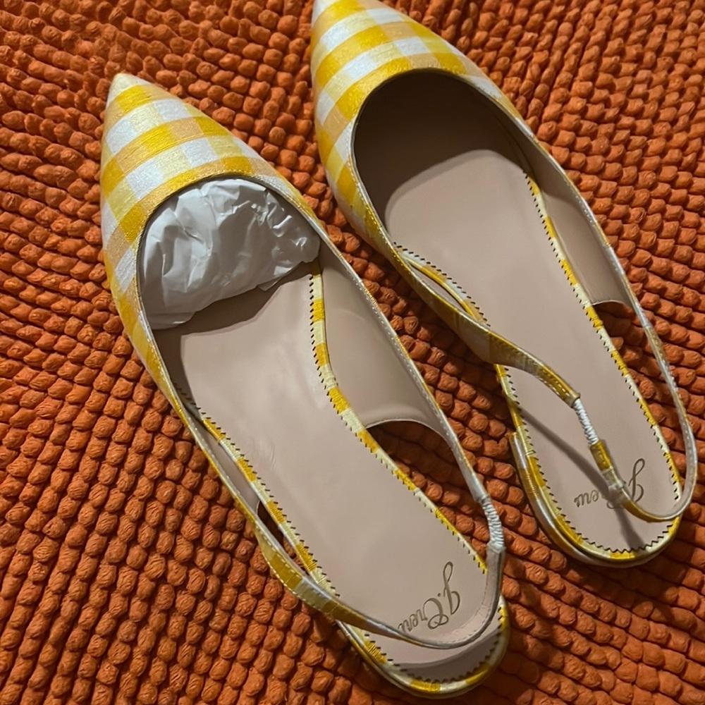 Yellow plaid flats with heel.